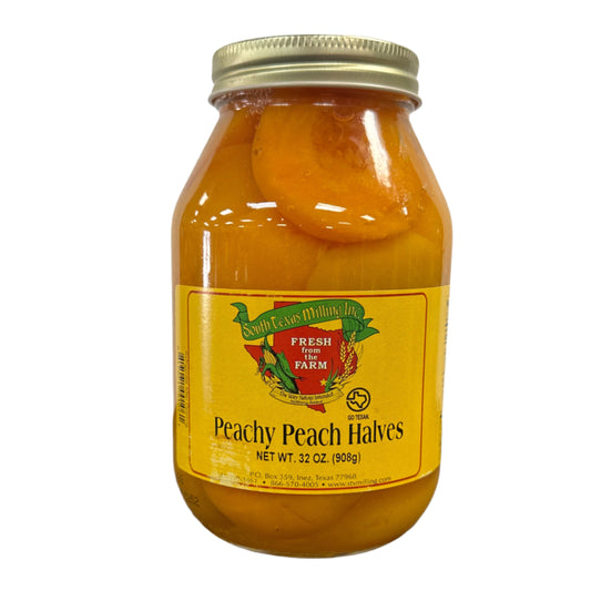 Jar of peach preserves on a textured surface